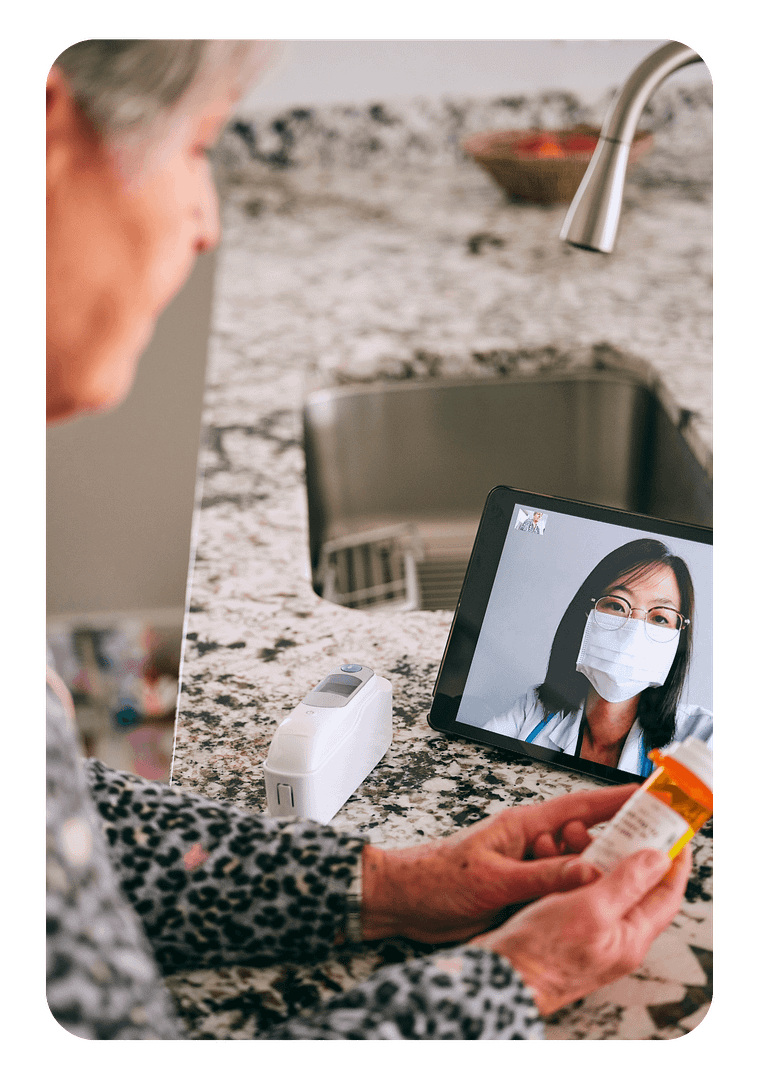 female elder talking to her doctor on a tablet for telemedicine